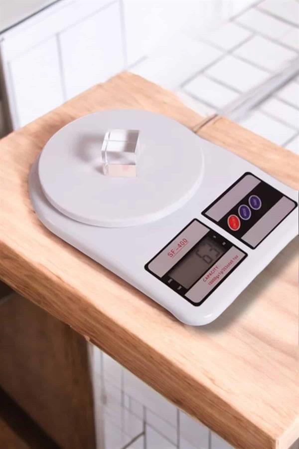 Kompakt Tasarım ve Tek Tuşla Sıfırlama Özelliğiyle Kullanımı Kolay Mutfak Tartısı